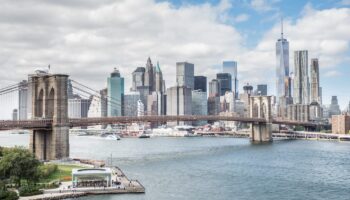 New York city night skyline from Brooklyn bridge